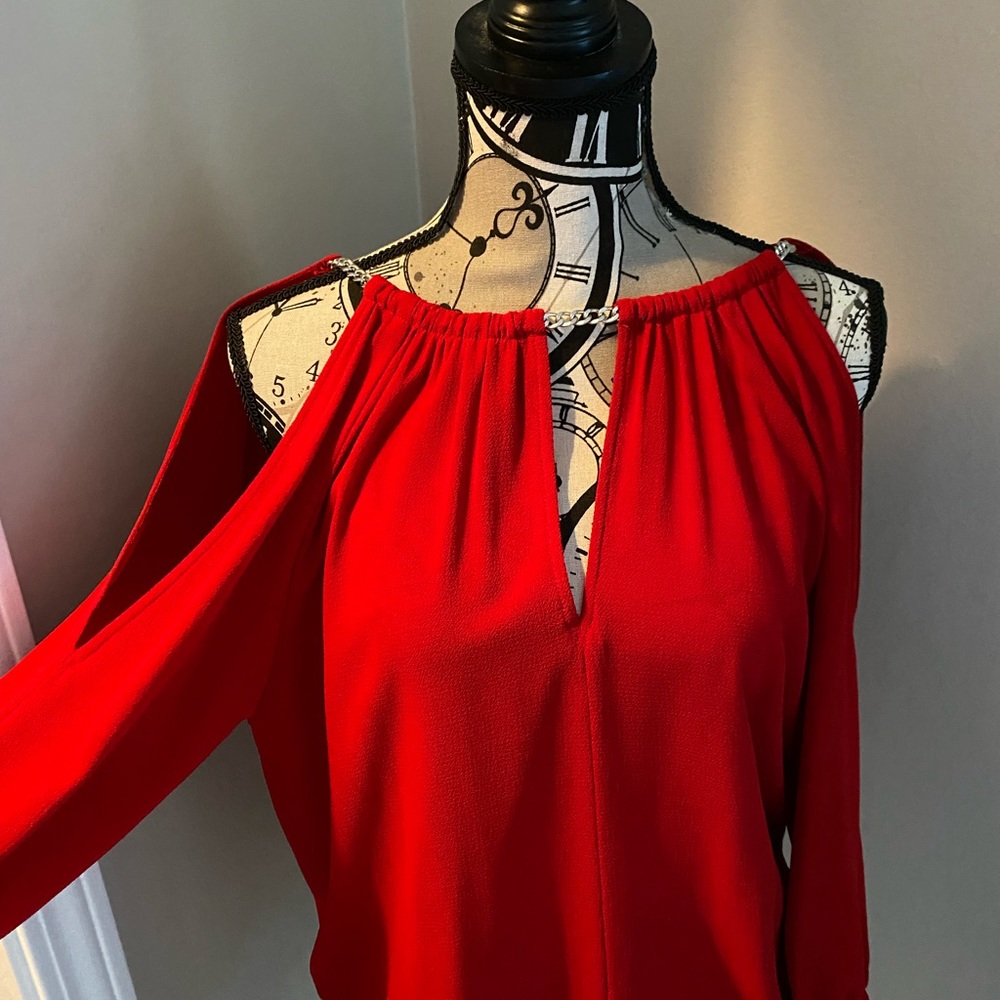 Michael Kors red cold shoulder blouse.
